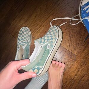 Dirty and worn in Vans Women's Green Checkered Slip-On Sneakers